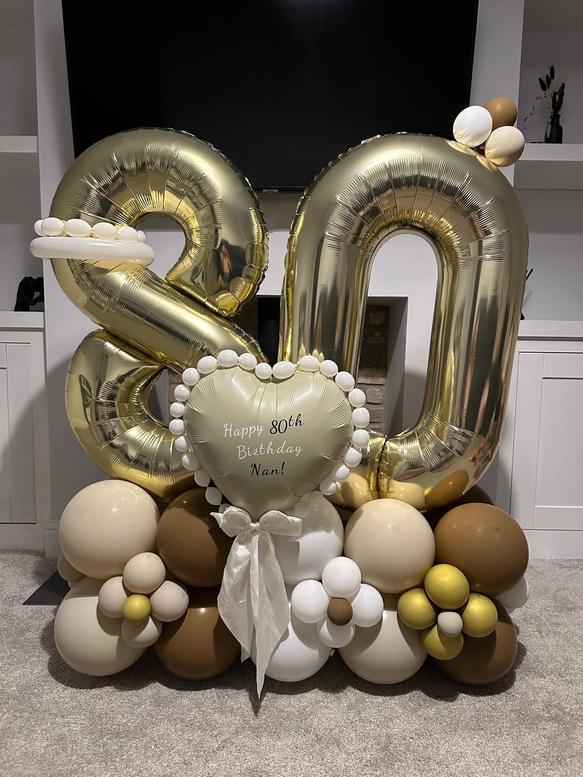 Gold 80th birthday balloon display